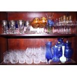 A quantity of glassware, including wines with gilt rim, champagne flutes, whisky tumblers, blue