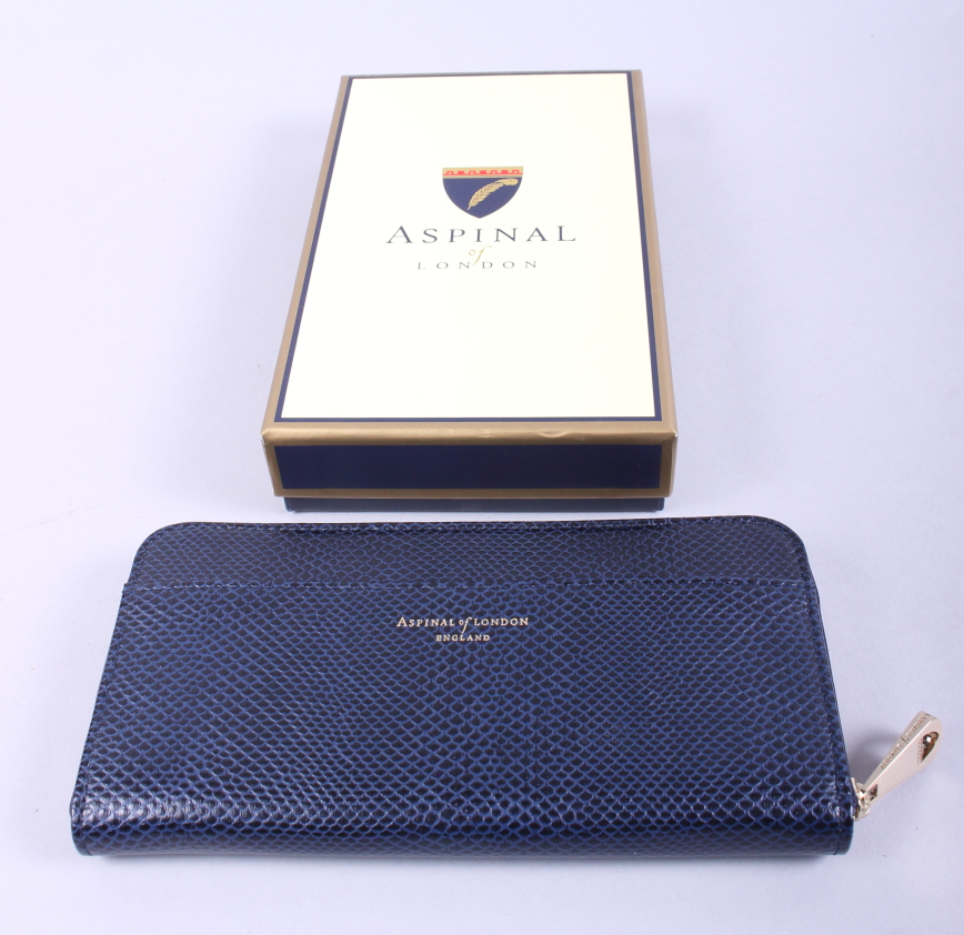 A lady's Aspinal of London blue leather purse, in original box