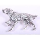 A white metal brooch, formed as a dog, stamped sterling
