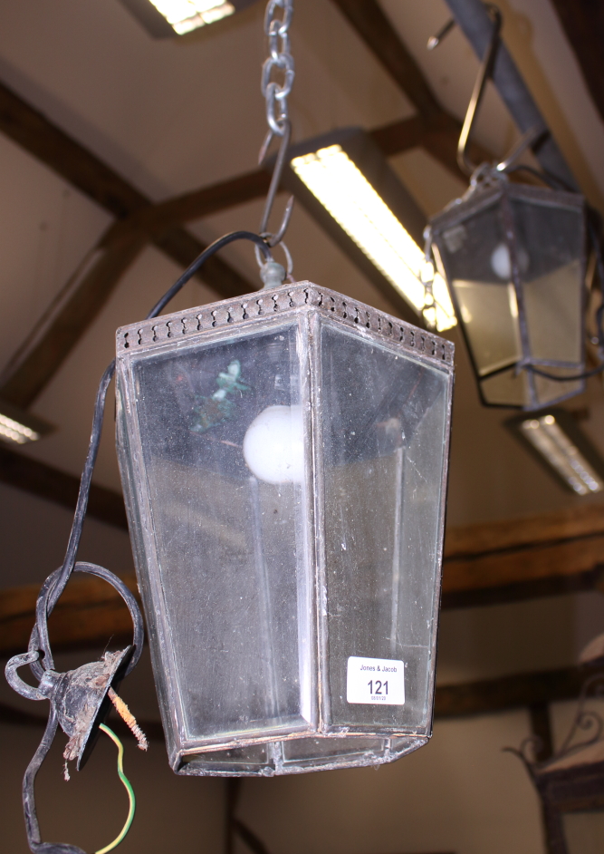 A pair of hexagonal metal hanging lanterns, 13" high