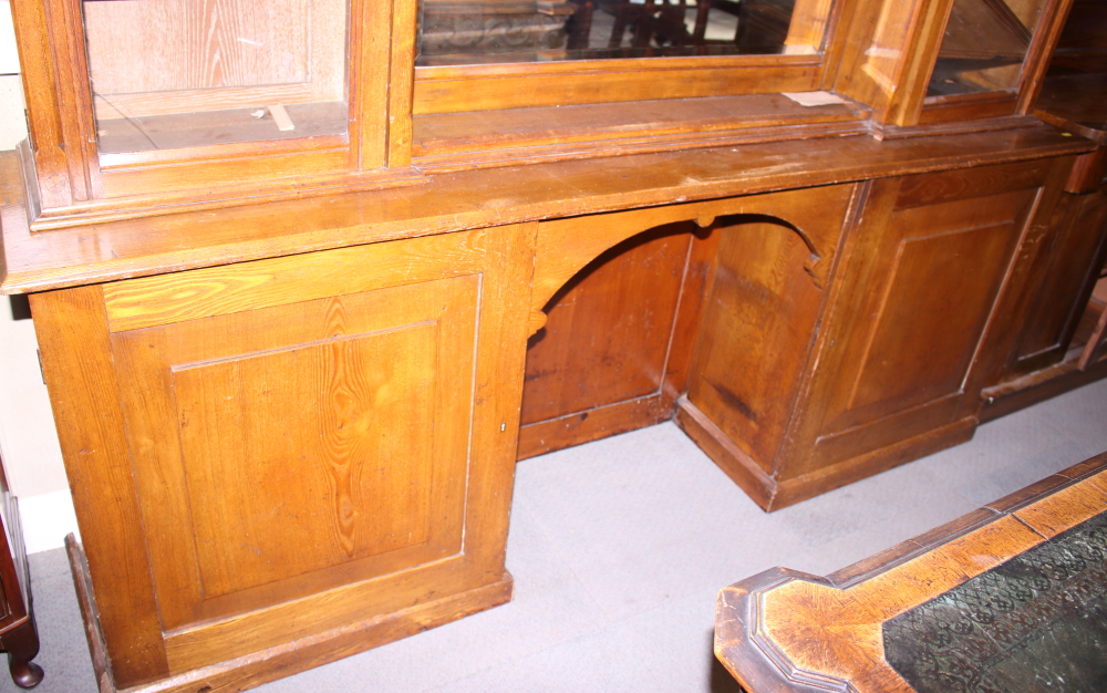 A late Victorian Aesthetic Movement ash, box and ebony inlaid bookcase enclosed by four glazed doors - Image 2 of 4