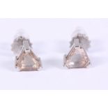 A pair of triangular solitaire diamond and white metal ear studs, stamped Plat 950