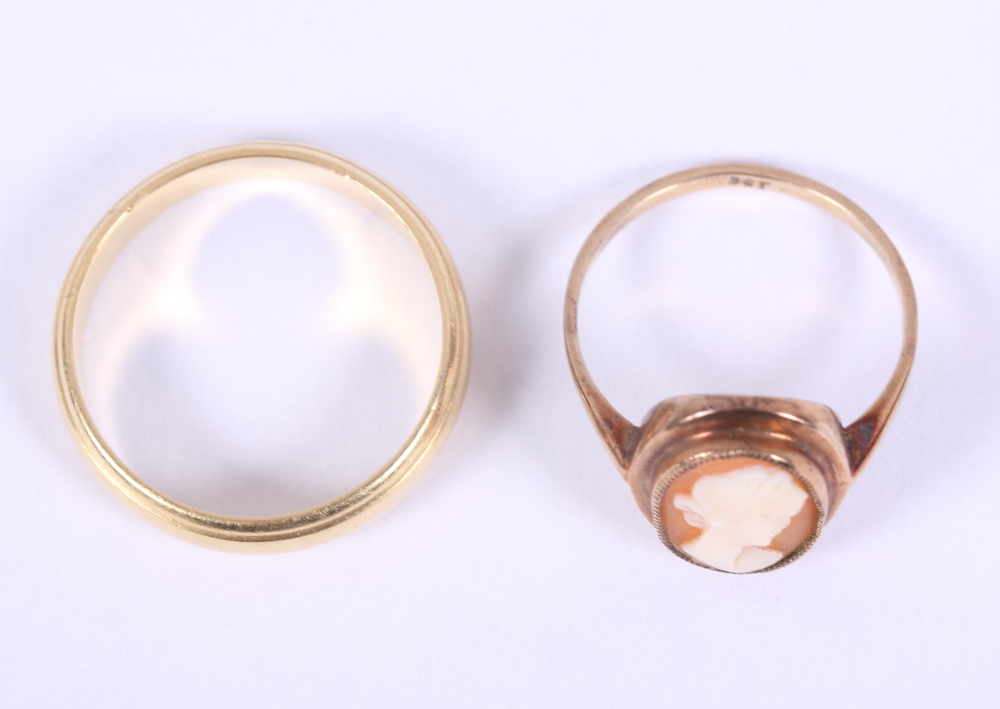 An 18ct gold wedding band, 5.7g, and a yellow metal cameo ring, stamped 9ct, 2.1g - Image 2 of 4