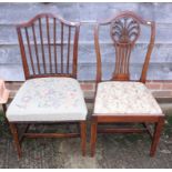 An Edwardian carved mahogany side chair with feather splat and a similar chair with vertical rail