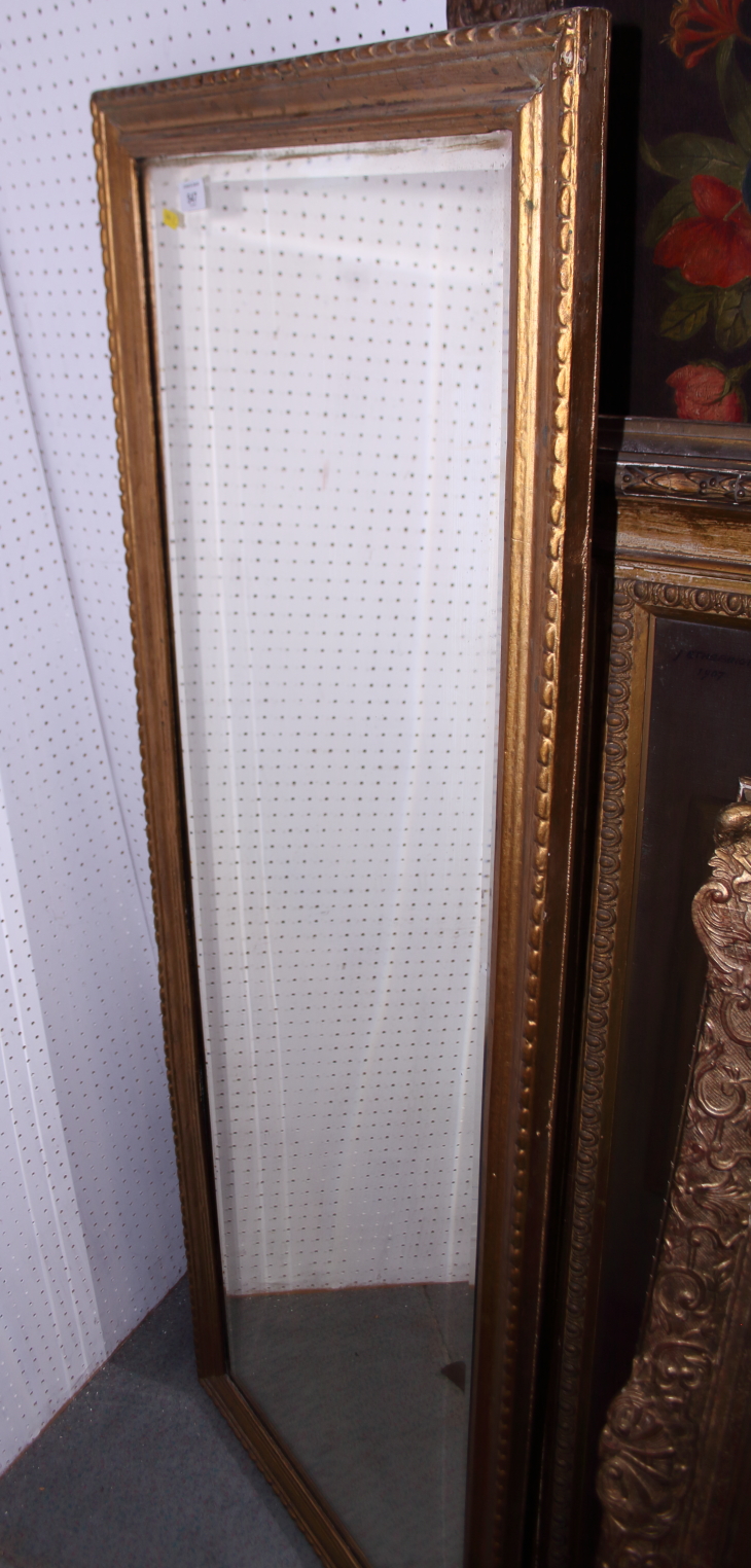 A rectangular gilt frame wall mirror with bevelled glass, 21 1/2" wide