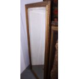 A rectangular gilt frame wall mirror with bevelled glass, 21 1/2" wide