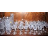 A suite of cut glass drinking vessels