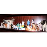 A Beswick model of a cat, a Beswick model of a donkey and other figures and model animals