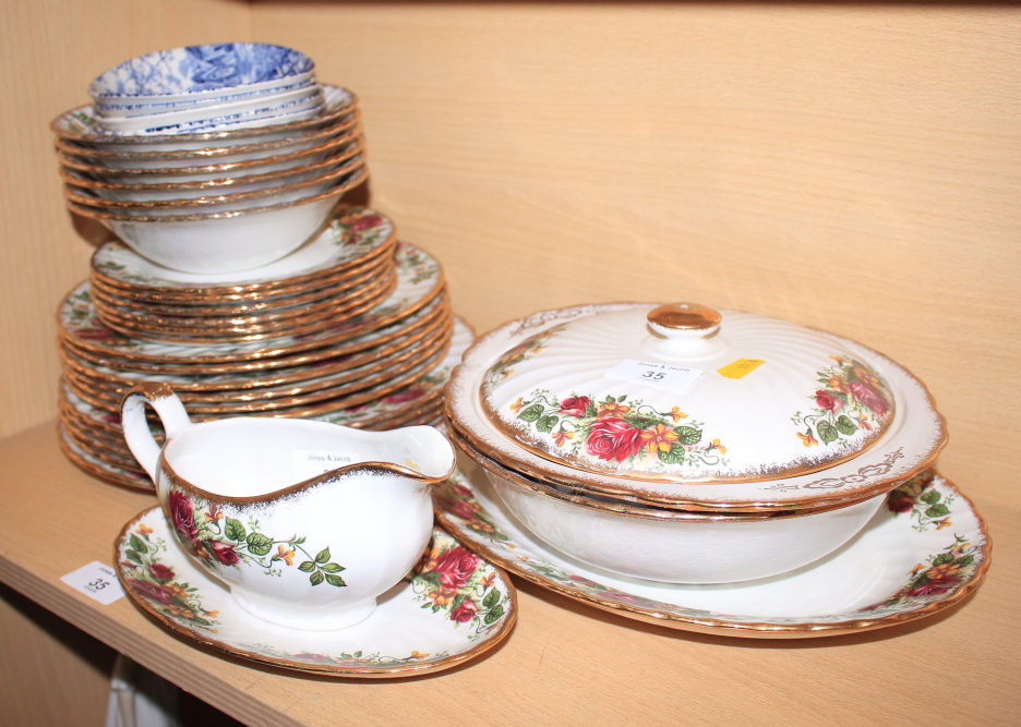 An Ironstone Washington pottery "English Rose" pattern part dinner service with five Johnson