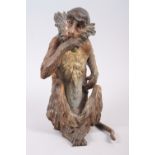 A 19th century Bergmann cold painted bronze model of a monkey eating fruit, 8 3/4" high