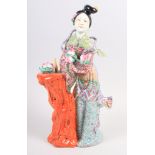 A Chinese Republic period Quan Yin figure with polychrome enamel decoration, impressed seal marks to