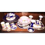 An English part dessert service, decorated flowers on a blue ground, two Spode plates, two spill