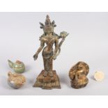 A bronze figure of a deity with stand, a similar model of Buddha, a celadon glazed inkwell, a