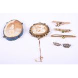 *Three Victorian yellow metal bar brooches, stamped 9ct, two carved shell cameo brooches and a