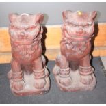 A pair of cast stone and painted Dogs of Fo, 18" high