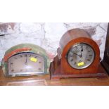 An early 20th century mahogany cased mantel clock, 7 1/4" high, and another mantel clock, in green