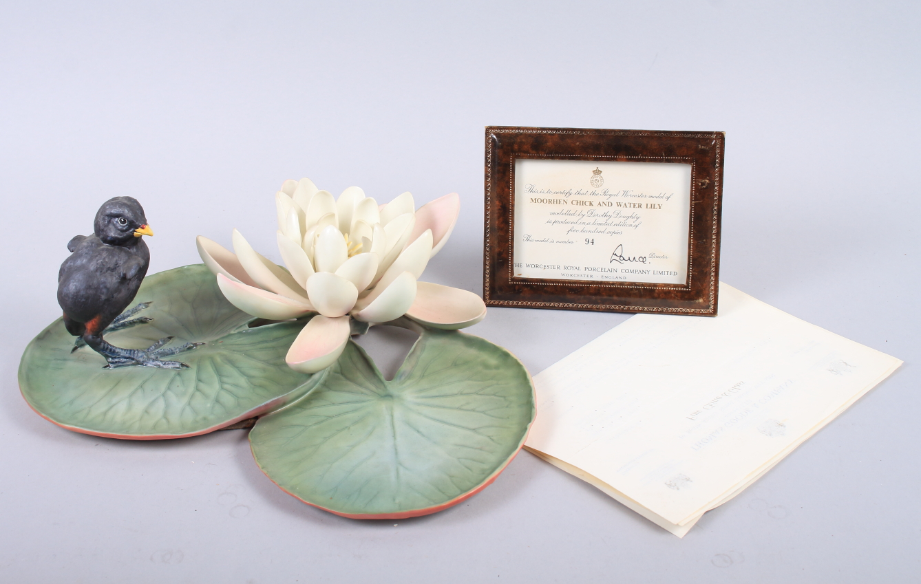 A Royal Worcester Dorothy Doughty model, "Moorhen Chick and Water Lily" No 94, with certificate