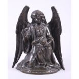 A 19th century patinated bronze figure of an angel and child in prayer, 9" high