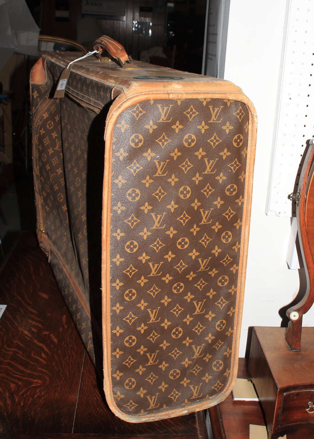 A vintage Louis Vuitton monogram pattern leather suitcase, 27 1/2&quot; x 21 1/2&quot;