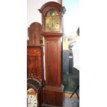 A late Georgian oak long case clock with arch top, brass dial, date window and second register by