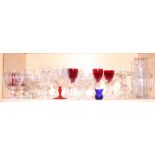 A collection of assorted drinking glasses, a Wedgwood majolica comport (damages) and a floral