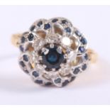 An 18ct gold, diamond and sapphire cluster ring, size L, 5.4g