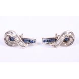 A pair of Art Deco style white metal, diamond and sapphire earrings, stamped 14K, 9.3g