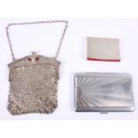 An Art Deco white metal cash purse, stamped 900, with owl motif and red cabochons, a chrome plated