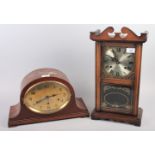 A Highlands thirty-one day mahogany mantel clock, 19" high, and an oak cased mantel clock, 10" high
