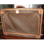 A vintage Louis Vuitton monogram pattern leather suitcase, 27 1/2" x 21 1/2"