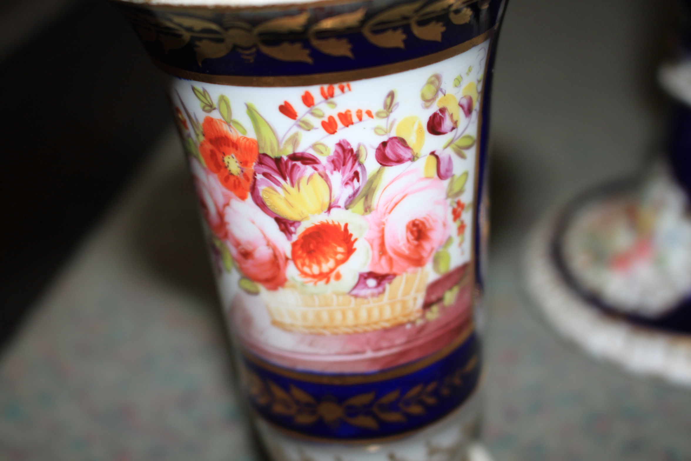 An English part dessert service, decorated flowers on a blue ground, two Spode plates, two spill - Image 23 of 28