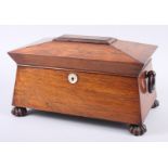 A rosewood sarcophagus tea caddy with mother-of-pearl escutcheon and ring handles, 13 1/4" wide