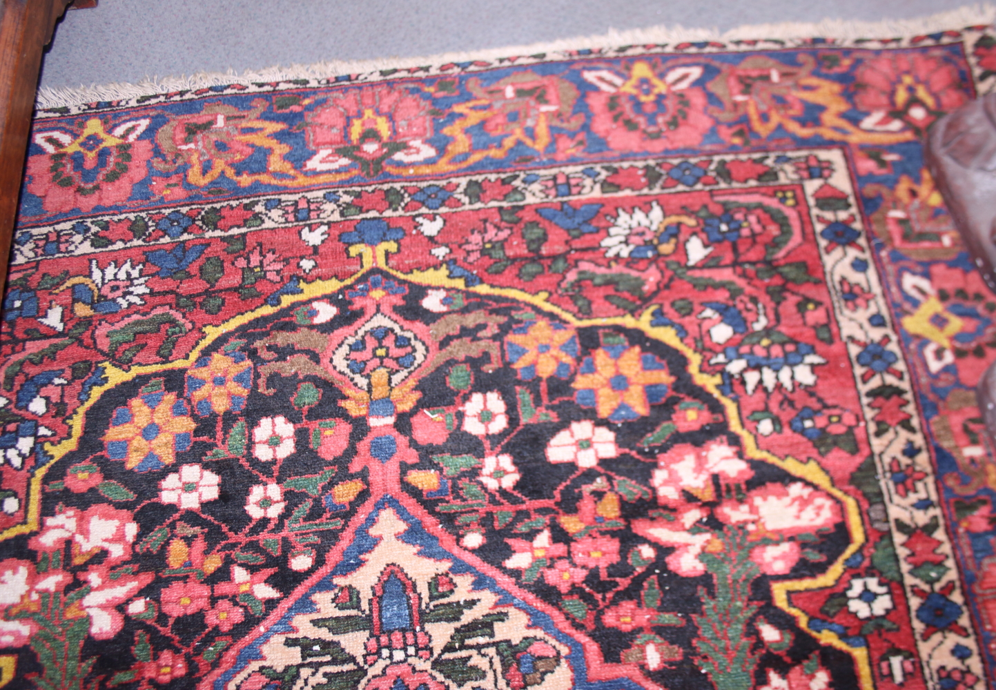 A Persian design rug decorated birds and flowers on a blue ground, 82" x 57" approx - Image 2 of 3