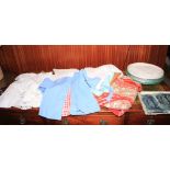 A quantity of linen, including infants' clothing and table linen, etc