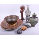 A Terracotta Army style ceramic figure of a soldier, two Middle Eastern copper dishes, a bronze