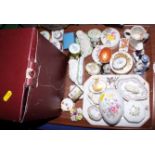 A quantity of Halcyon Days pill boxes, two patch boxes, four model sheep, two figures, a