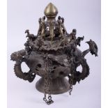An 18th century style Chinese bronze censer, decorated dragons, monkeys, birds and lizards