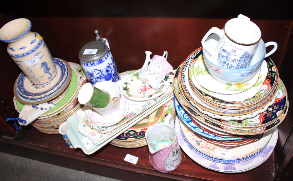 A KPM blue and white stein, a quantity of Royal Doulton "Matsumai" pattern plates, mixed plates