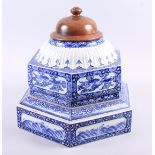 A Chinese blue and white porcelain sectional stand with associated wooden top