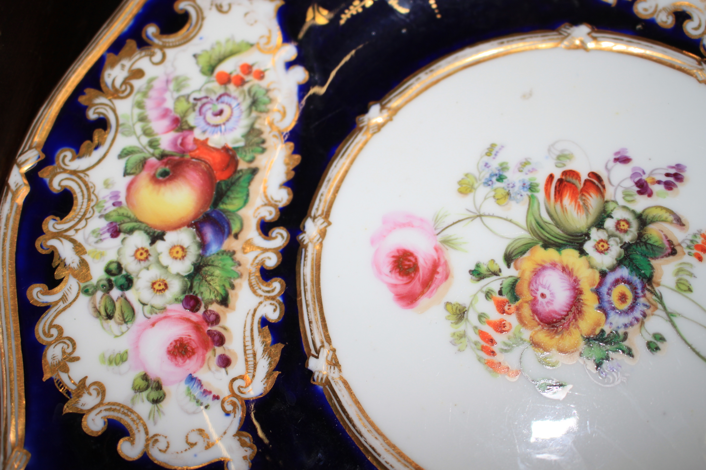 An English part dessert service, decorated flowers on a blue ground, two Spode plates, two spill - Image 18 of 28