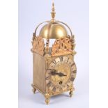 A Mercer brass lantern clock with Roman numerals, 11" high