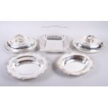 Two silver plated entree dishes, a pierced tray and two other plated trays