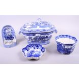 A blue and white chamberstick, decorated horse and chariot, a "Willow" pattern tureen (damages), a