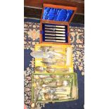 A quantity of silver plated cutlery, including knives, forks, fish servers and a cased set of fish