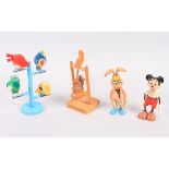 A Marx toys Mickey Mouse figure, 5 1/4" high, a companion Brer Rabbit, a Russian bear in the moon