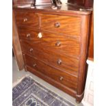 A mahogany chest of two short and three long graduated drawers, on bun feet, 46 1/2" wide