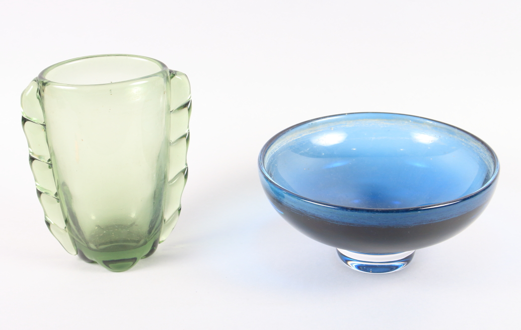 A Kosta blue glass shallow dish, 9" dia, and a green glass vase, 7 3/4" high