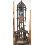 A Victorian cast iron mirrored back hall stand, by Falkirk, Pattern Number 262, Number 17, 81" high