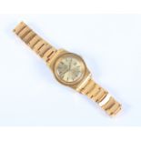 A lady's Omega Geneve gilt metal bracelet watch with automatic movement, gilt dial with baton