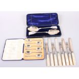 A set of six silver teaspoons, 2.6 oz troy approx, boxed, mother-of-pearl handled cutlery and a pair